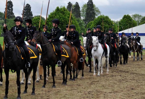 © Jennifer Singleton – Please do not copy or save without permission competitors lined up and awaiting their turn in the tent-pegging competition; in this class, they gallop across the arena, two at a time, and attempt to spear (and pick up) what appears to be a chunk of styrofoam on the ground