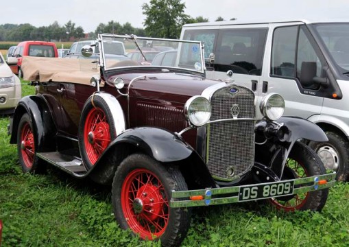 a beautiful old Ford roadster, standing with all the other, "regular" cars in the championship's parking lot